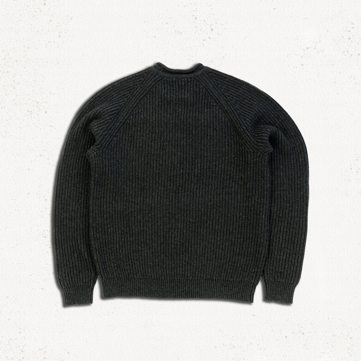 Tarbert Fisherman's Jumper in Slate, flat lay of the back showing the ribbed panel and raglan sleeves.